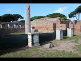 01264 ostia - regio ii - insula i - caserma dei vigili (ii,v,1-2) - statuenbasen vor dem caesareum - geta - caracalla - iulia domna.jpg